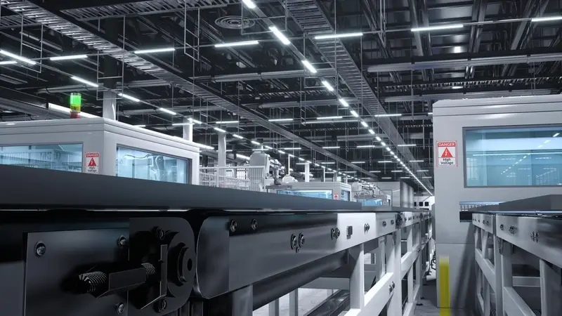 Heavy production machinery on the TFM factory floor